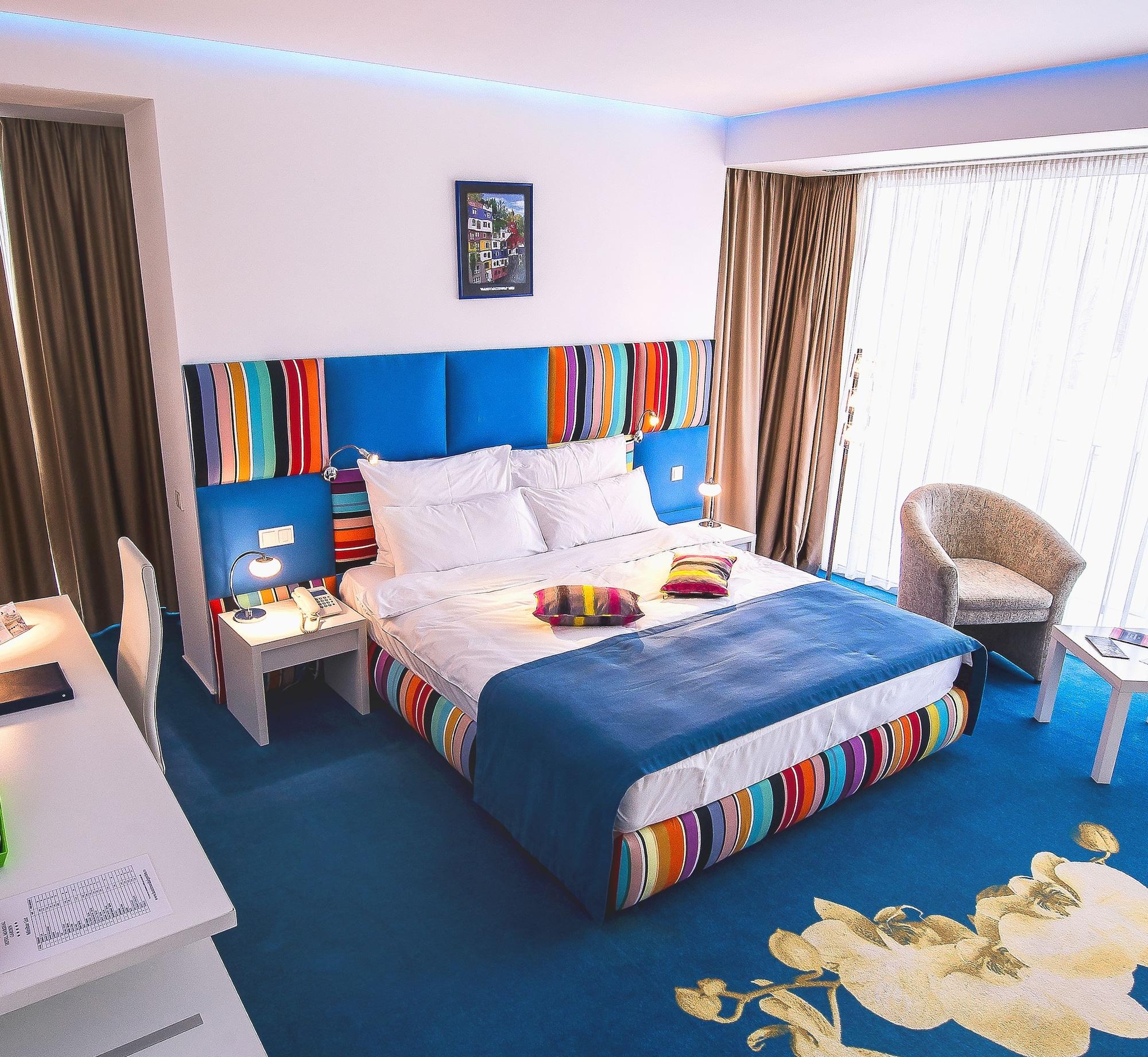 Marshal Garden Hotel Bukarest Kültér fotó A room at the hotel