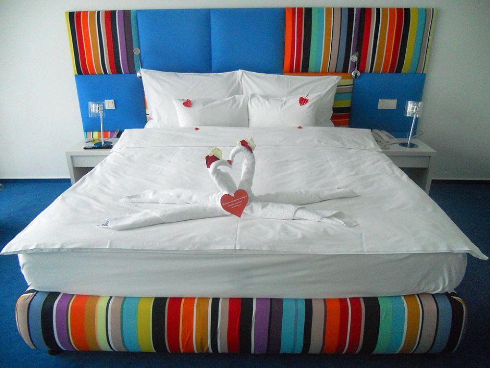 Marshal Garden Hotel Bukarest Kültér fotó A bed